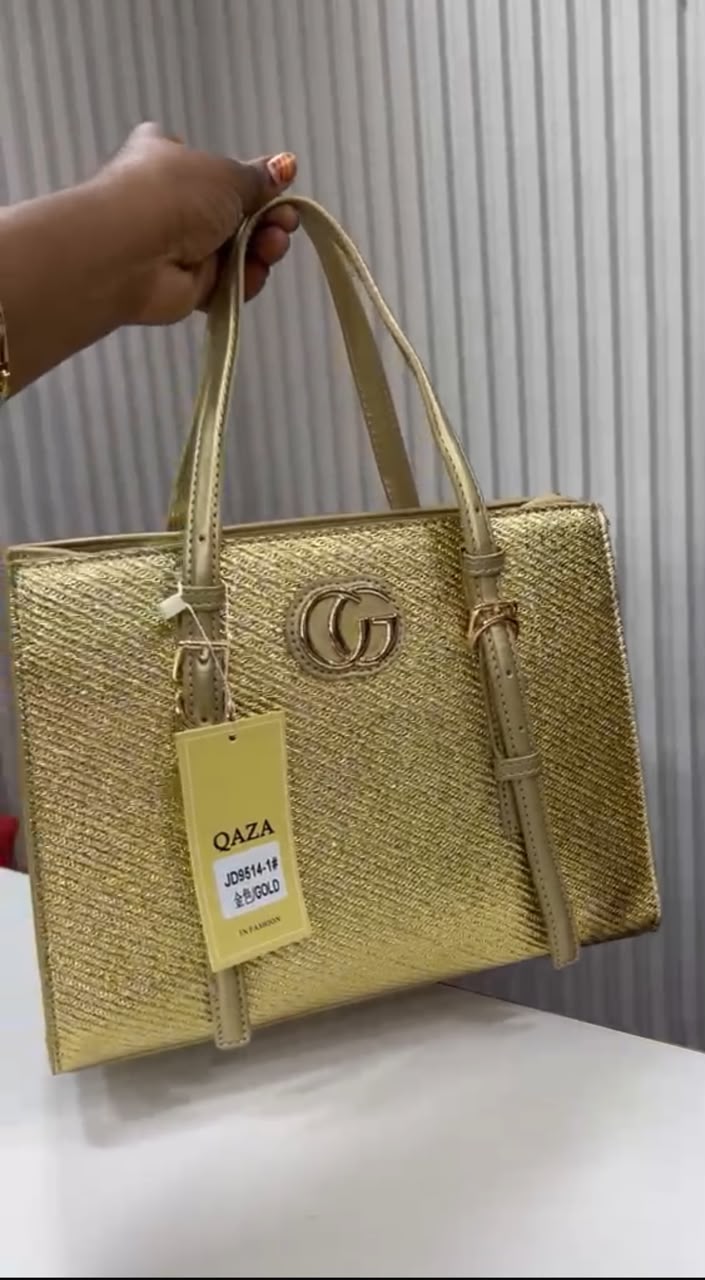 Sac Gucci doré avec pochette